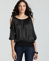 Top off your favorite jeans with this Bailey 44 top, featuring modern cutout shoulders and an elegant blouson bodice.