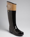 The classic Hunter Rain Boot goes riding with sharp, chic equestrian style.