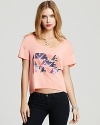 A colorful geometric pattern boldly punctuates this Hurley tee, fashioned in a trend-perfect cropped silhouette.