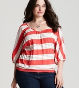 Playful cabana stripes pattern this Splendid top, designed in a relaxed silhouette eased by flowing dolman sleeves.