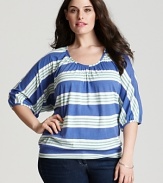 Playful cabana stripes pattern this Splendid top, designed in a relaxed silhouette eased by flowing dolman sleeves.