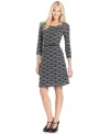 Wavy, trimmed tiers make this ECI dress eye-catchingly stylish!