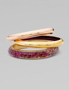 EXCLUSIVELY AT SAKS.COM. A bold set of 14k plated metal and resin covered bangles to stack along the wrist.Resin covered skin 14k goldplated Total width, about 2½ Made in USA Please note: Pattern may vary. 