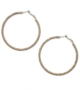 This time with feeling. INC International Concepts' large hoop earrings, crafted from gold-tone mixed metal, are textured to give them a different stylish sensation. Approximate diameter: 2-1/4 inches.