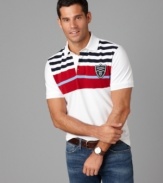 Featuring a crisp color palette and classic stripes, this Tommy Hilfiger polo shirt will be your new weekend go-to.