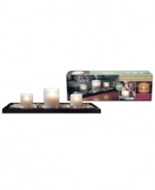 Experience the zen serenity and elegant aesthetic of three flickering candles nestled in a custom wood tray filled with genuine river rocks.