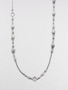 From the Quatrefoil Collection. An extra long sterling silver chain with bead and quatrefoil stations.Sterling silver Can be worn doubled Length, about 48 Lobster clasp closure Imported 