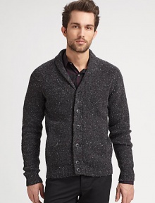 A shawl-collar cardigan with a brilliant tweed pattern.Shawl collarButton frontRibbed trim80% wool/20% polyamideDry cleanImported