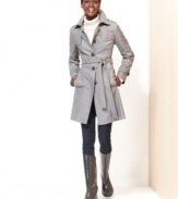 You'll hope for blustery days with DKNY's trench coat. The quilted construction adds a unique touch to this classic silhouette.