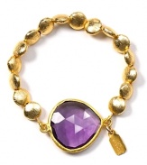 Coralia Leets' purple quartz stretch bracelet is an effortless take on luxury materials. Let the vibrant gemstone peek from a gauzy blouse to complete a bohemian look.