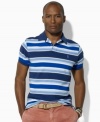 Classic stripes lend a crisp, polished look to a relaxed-fitting polo shirt in breathable cotton mesh.