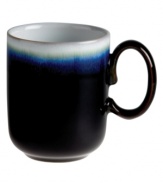 A striking multicolor glaze and rounded base that's perfect for cupping ensure the Double Dip mug wake up decor and drinker alike. Oven- and microwave-safe stoneware makes it quick and easy to reheat hot tea, coffee or soup.