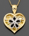 This classic heart pendant is lovingly embellished with a sweet five-petal flower. Crafted in white and yellow 14k gold. Approximate length: 18 inches. Approximate drop: 3/4 inch.