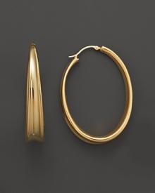 These bold 14K. gold hoops are a fresh take on the classic silhouette.