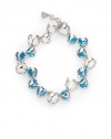 THE LOOKBlue quartz beads Cutout link accents Rhodium-plated sterling silver settingSignature Tridara claspTHE MEASUREMENTLength, about 7.5ORIGINImported