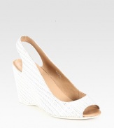 Woven slingback design in soft Italian leather with a substantial wedge and peep toe. Self-covered wedge, 3½ (90mm)Leather upperLeather liningRubber solePadded insoleImportedOUR FIT MODEL RECOMMENDS ordering one half size up as this style runs small. 