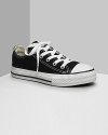 Low cut Converse All Stars. This classic canvas sneaker set the standard in cool and comfort. Available in infant sizes. With lace-up canvas uppers, contrast stitching and rubber sole and toe.