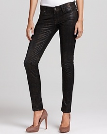 A glam metallic sheen gives the illusion of exotic snakeskin on these 7 For All Mankind ultra-skinny coated jeans.