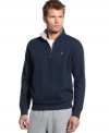 When the weather turns brisk, you'll be happy to have this comfy Nautica pullover on your side.