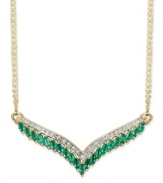 Enhance the glamour of an elegant v-neck gown. This v-shaped pendant necklace is adorned by marquise-cut emeralds (1-1/2 ct. t.w.) and a seamless row of round-cut diamonds (1/7 ct. t.w.). Crafted in 14k gold. Approximate length: 18 inches. Approximate drop length: 1 inch. Approximate drop width: 2-7/8 inches.