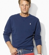 A comfortable, lightweight crewneck pullover is rendered in breathable cotton mesh for casual style.