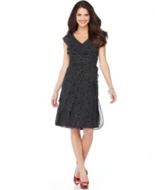 Adrianna Papell's petite polka dot dress features pleated detail at the bodice and sheer, sweeping tiers through the skirt. Pairs easily with black peeptoe pumps, and can be just as easily played up with red or yellow heels!