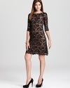 Brimming with dark romance, this Karen Kane dress flaunts allover black lace for a captivating cocktail ensemble.