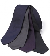 Classic skinny silk tie in a solid color.