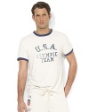 A vintage-inspired ringer T-shirt celebrates Team USA's participation in the 2012 Olympic Games with a faded graphic.