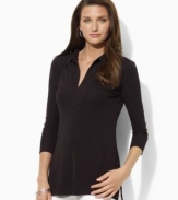 Rendered in fluid matte jersey for a flattering drape, this Lauren by Ralph Lauren tunic exudes chic minimalist style with three-quarter sleeves and a feminine V-neckline.