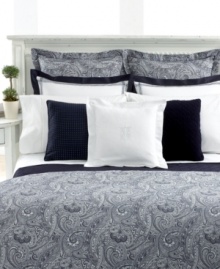 The rich look of paisley brings tailored texture to your bedroom in this Navy Paisley Suite comforter from Lauren Ralph Lauren. Trimmed with luxurious self cording over 383-thread count woven jacquard, this pattern combines traditional beauty with studied, modern appeal.