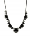 Glittering and gorgeous. Givenchy's dramatic necklace is elegantly embellished with jet and black glass accents. Set in hematite tone mixed metal, it's the perfect complement for a variety of special occasion ensembles. Approximate length: 16 inches + 2-inch extender.