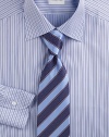 A suit-defining silk tie crafted with wide stripes. Silk Dry clean Made in Italy 