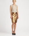 Embrace the unpredictable leather trend in this sleek metallic pencil skirt with a high front slit. Invisible back zipperFront slitAbout 22 longLeatherDry clean with leather specialistImported of Italian fabricModel shown is 5'10 (177cm) wearing US size 4.