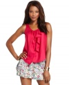 A cascading ruffle adds feminine flair to this BCBGeneration tank -- perfect for a sweet summer look!