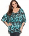 Enliven your look this season with INC's butterfly sleeve plus size top, featuring a striking print-- it's a must-buy!