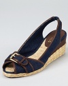 In dark denim with a walkable heel, these Lauren by Ralph Lauren wedges beckon off-duty days and picnics in the park.