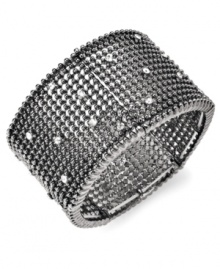 Round it up. Elevate your look with circular chic in the form of this stylish stretch bracelet from Alfani. Embellished with glittering crystals, it's made in hematite tone mixed metal. The stretch design lets it slip on and off with grace and ease. Approximate diameter: 2-1/2 inches.