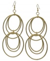 Ring in sophisticated style with GUESS. These multi-hoop earrings are crafted in gold tone mixed metal with textured detail. Approximate drop: 4 inches. Approximate diameter: 1-3/4 inches.