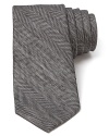 Handsome herringbone exudes classic sophistication, but with a narrower width this dapper tie has plenty of modern appeal, too.