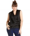 Dress up your casual look with Baby Phat's faux wrap plus size top, featuring a draped design.