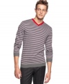 Go from dud to stylish stud in the Sons of Intrigue stripe v-neck long sleeve fitted sweater.