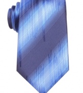 With subtle dimension, this tie from John Ashford is a modern update for a traditional solid tie.