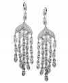 Sparkling and stunning! Givenchy's gorgeous chandelier earrings are the perfect finishing touch for any elegant evening ensemble. Embellished with an array of glittering glass accents and crystals, they're set in silver tone mixed metal. Approximate drop: 4 inches.