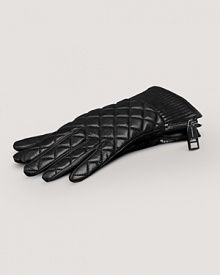 Chic quilted lambskin gloves with soft cotton lining and zipper detail at wrist.