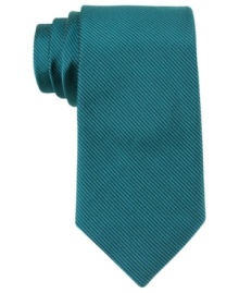 Give your basic dress wear a pop of teal with this cool skinny tie from Calvin Klein.