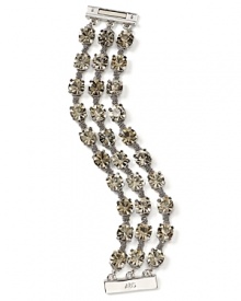 Wear three times the sparkle at your wrist with ABS by Allen Schwartz's chain and rhinestone bracelet. The triple-strand style adds instant drama and sparkle when you head downtown after dark.