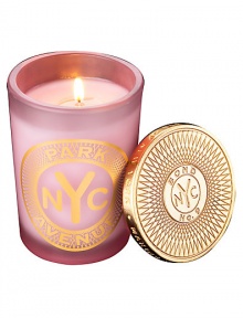 From a uniquely New York collection of scents, this feminine, floral-scented candle pervades the air with elegance.  · Paperwhite, iris, rose, with soothing chamomile  · Made of the finest wax and wicks  · In sturdy, tinted glass container  · Gilt metal cap keeps scent from fading  · Burn time, approx. 60 hours 