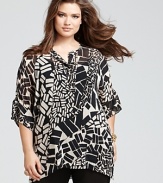 Update your print portfolio in this gossamer Lafayette 148 New York top, cut in a flowing silhouette and emboldened in a graphic geometric pattern.