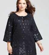 Look stunning in sequins when you wear this Lafayette 148 New York linen tunic. Perfect for topping slim pants, it also doubles as a daring dress with opaque tights and heels.